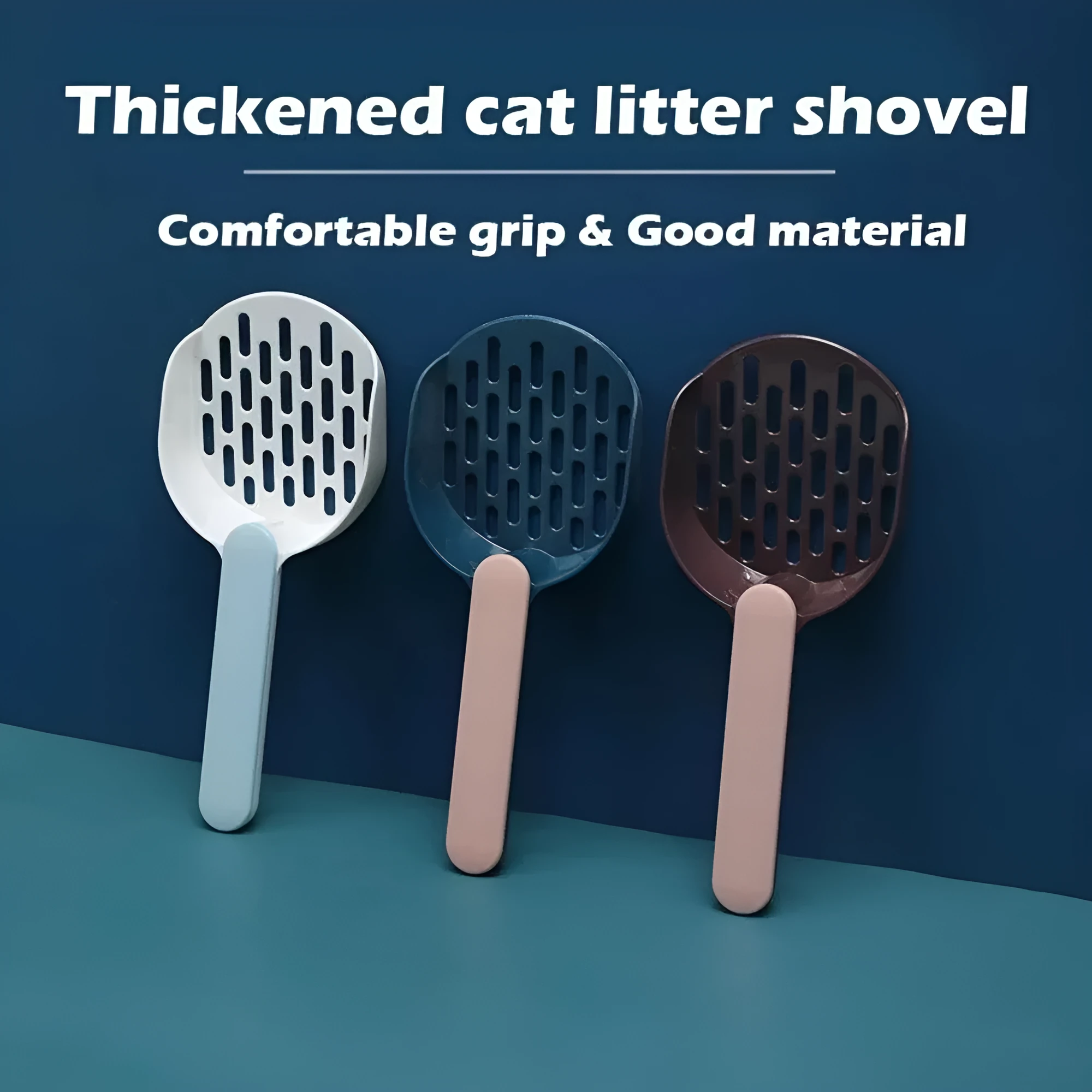 Blue plastic cat litter shovel scoop for cleaning litter boxes, shown next to a litter tray.