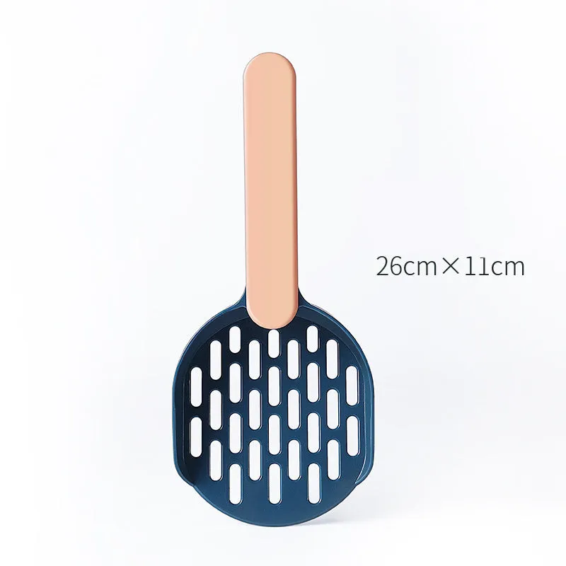 Blue plastic cat litter shovel scoop for cleaning litter boxes, shown next to a litter tray.