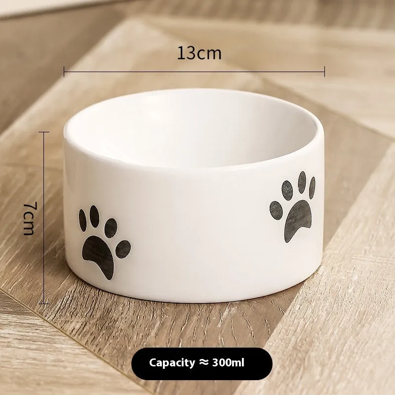 Ceramic cat bowl with high-foot design and cat's paw pattern in choice of colours