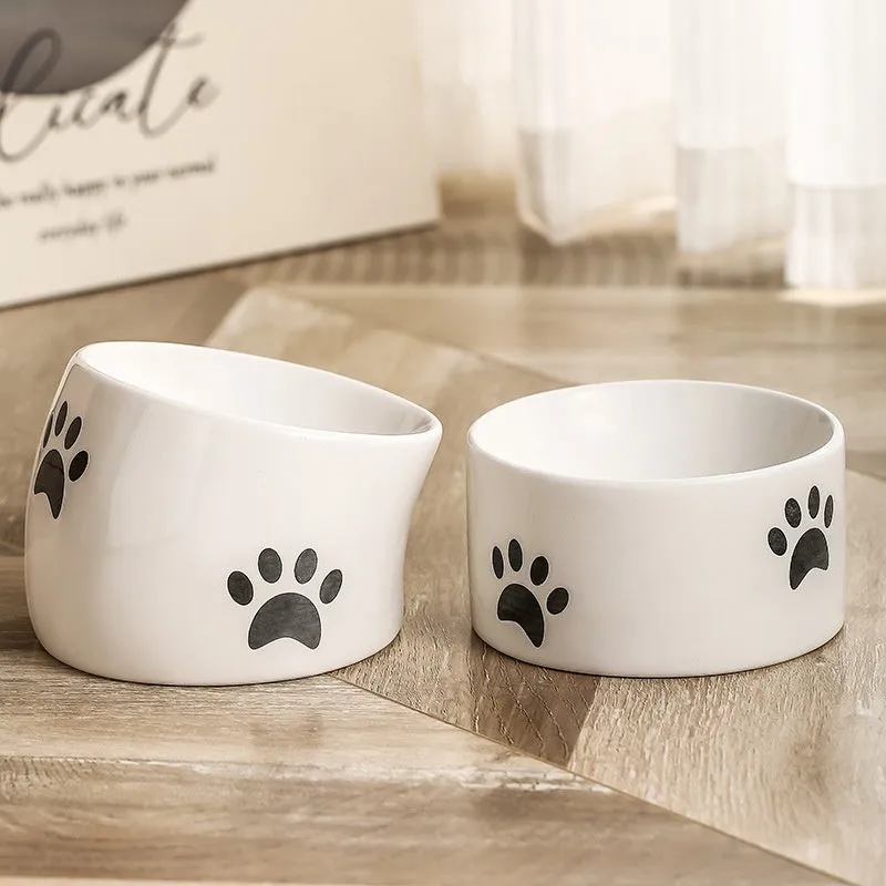 Ceramic cat bowl with high-foot design and cat's paw pattern in choice of colours