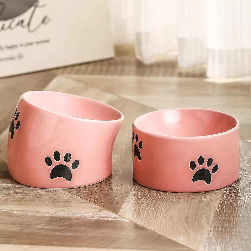 Ceramic cat bowl with high-foot design and cat's paw pattern in choice of colours