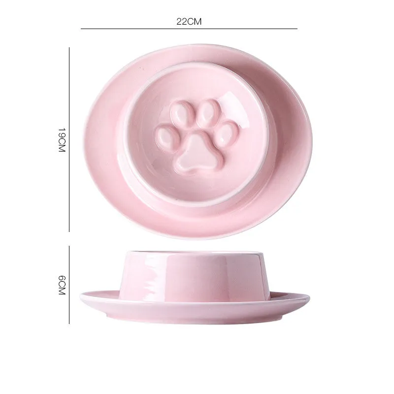 Green ceramic pet bowl with raised neck protection collar and anti-knock slow feed design