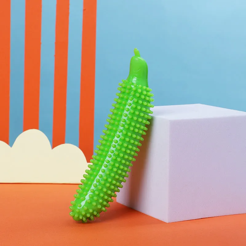 Green cucumber-shaped dog teething toy with bite-resistant construction for puppies