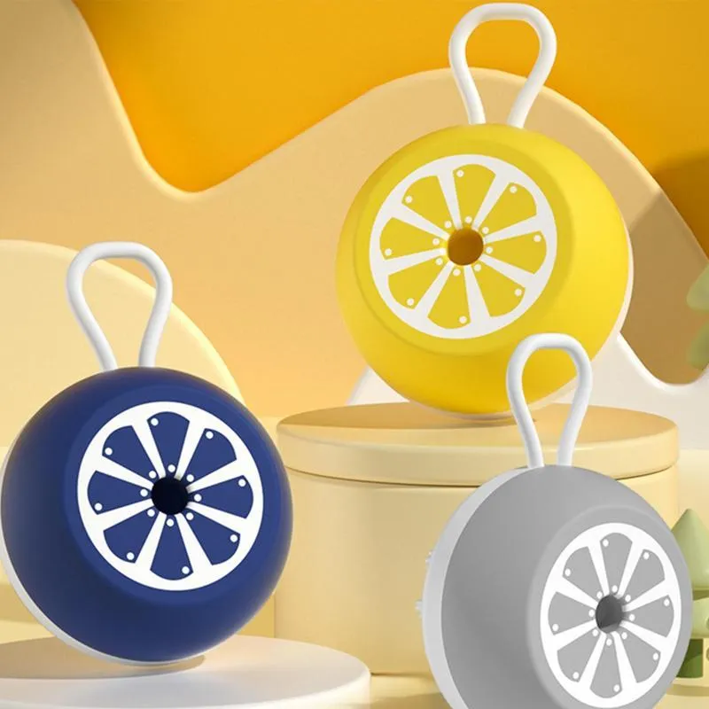 Blue, grey, and yellow silicone dog shampoo brush with massage points for washing and grooming