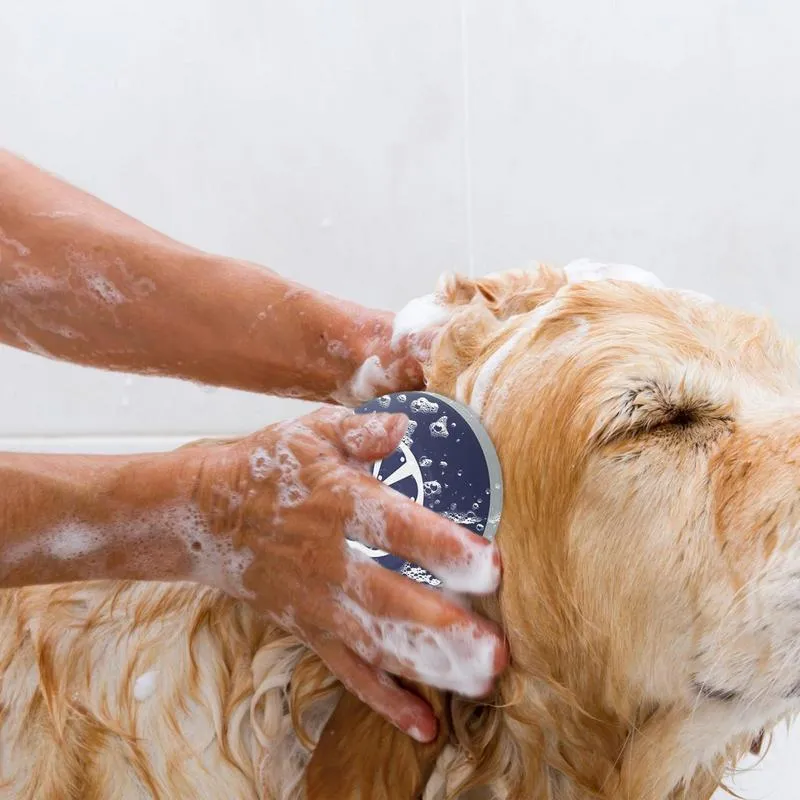 Blue, grey, and yellow silicone dog shampoo brush with massage points for washing and grooming