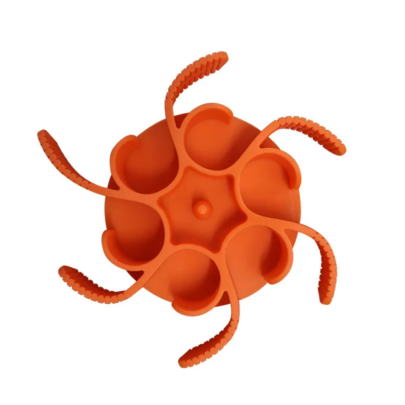 Red or grey silicone dog slow feeder insert with suction cups and conical handles on a white background.
