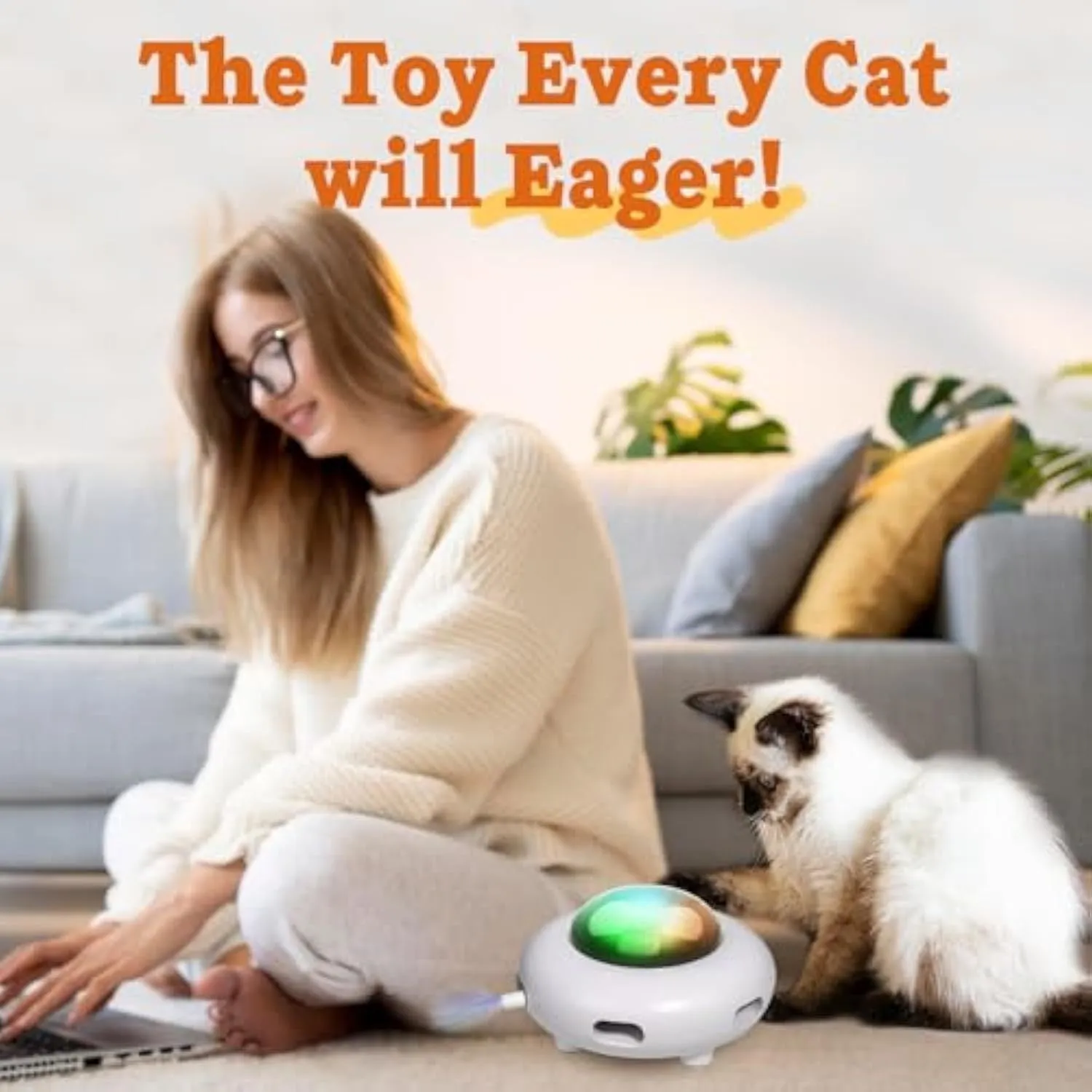 White UFO-shaped automatic cat toy with colourful LED lights and feather attachments