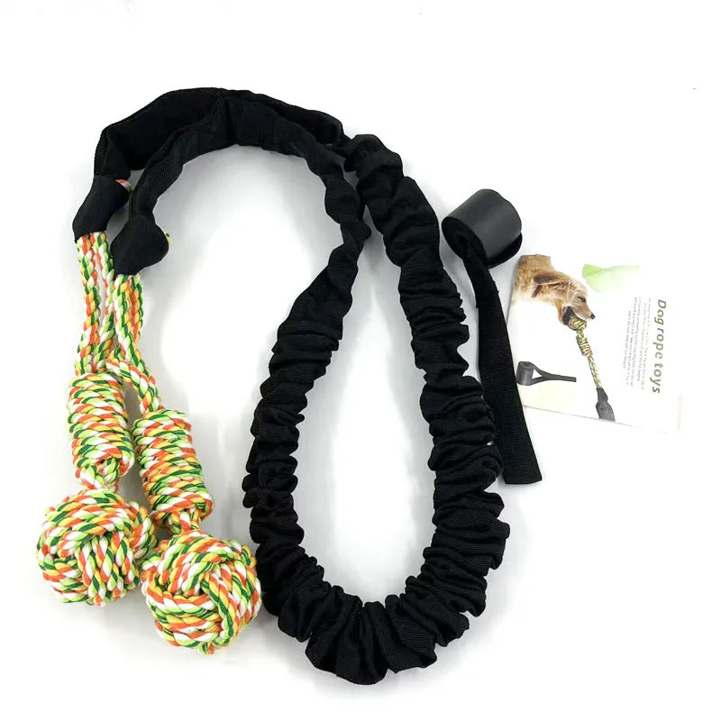 A woven cotton rope dog toy for tug of war and chewing, shown in red.