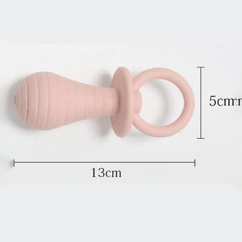 Four coloured pet pacifier chew toys with squeaker for puppies and kittens