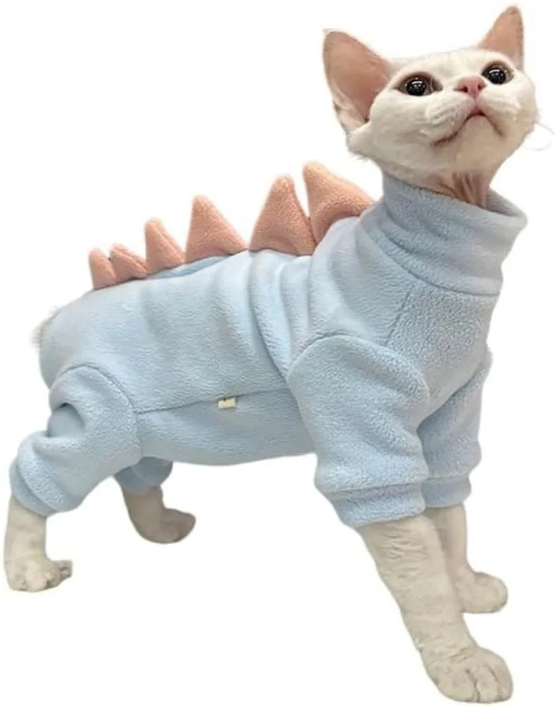 Sphynx cat wearing dinosaur costume with tail and spikes