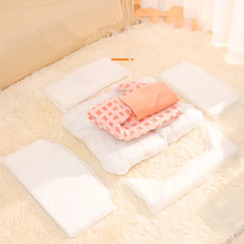 Green triangular hat-shaped pet sleeping nest for cats on a floor, showing its thick sponge construction.