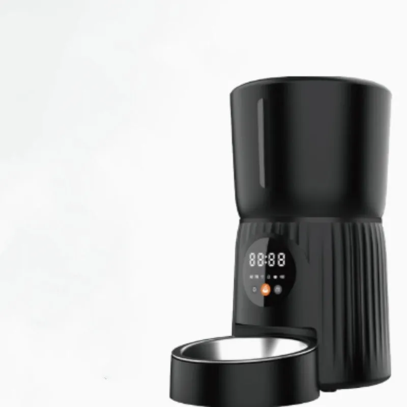 Black and white automatic intelligent pet feeder with USB cable for timed, portion-controlled feeding.