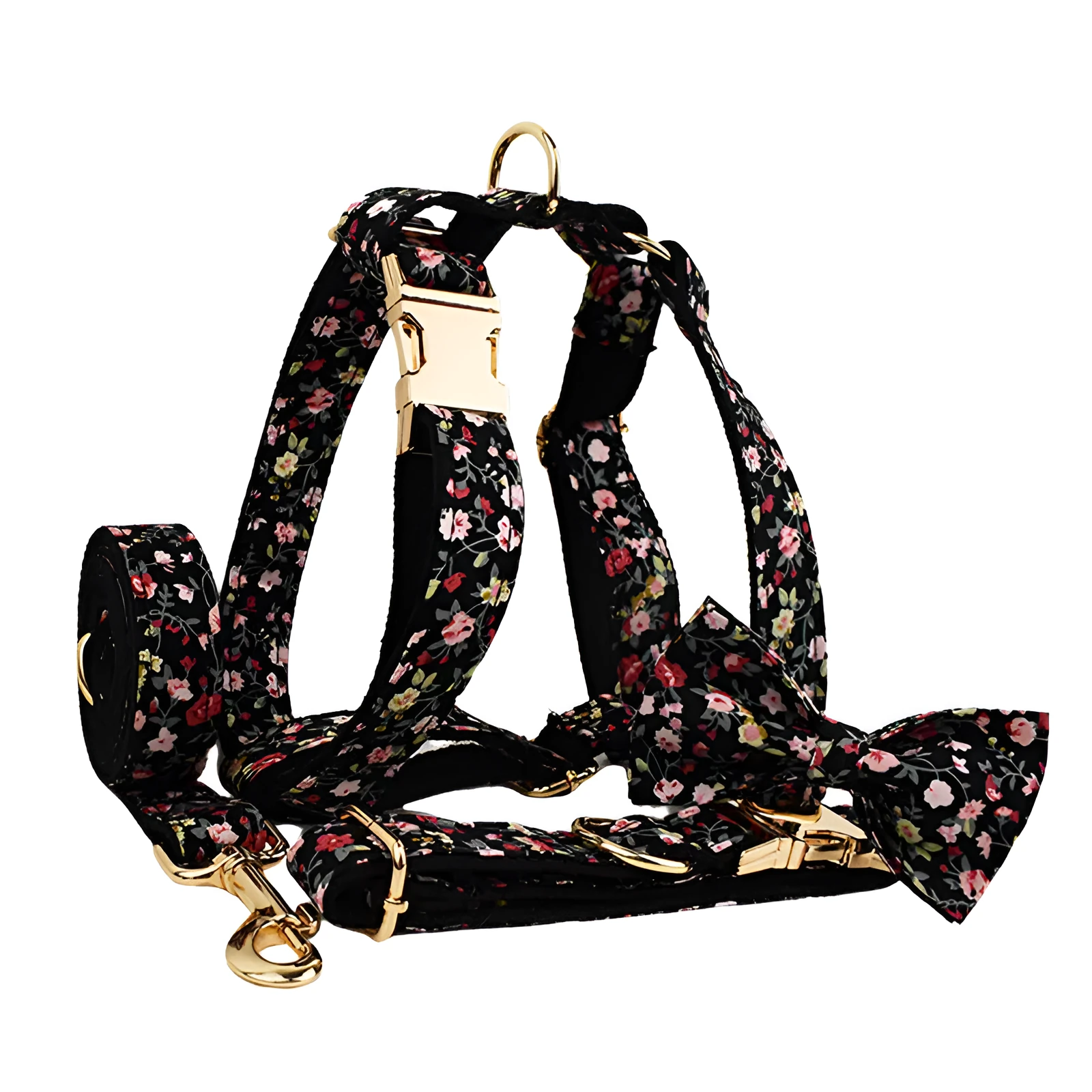Dog wearing a cloth collar with removable bow, matching vest, and leash from the four-piece pet accessory set