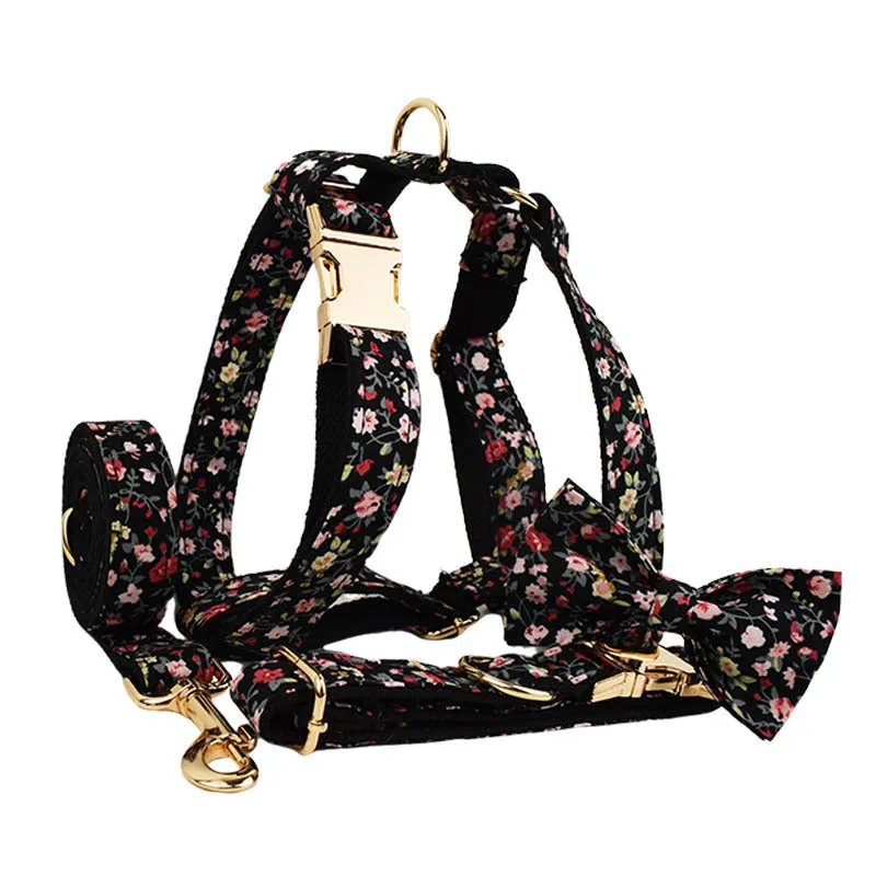 Dog wearing a cloth collar with removable bow, matching vest, and leash from the four-piece pet accessory set