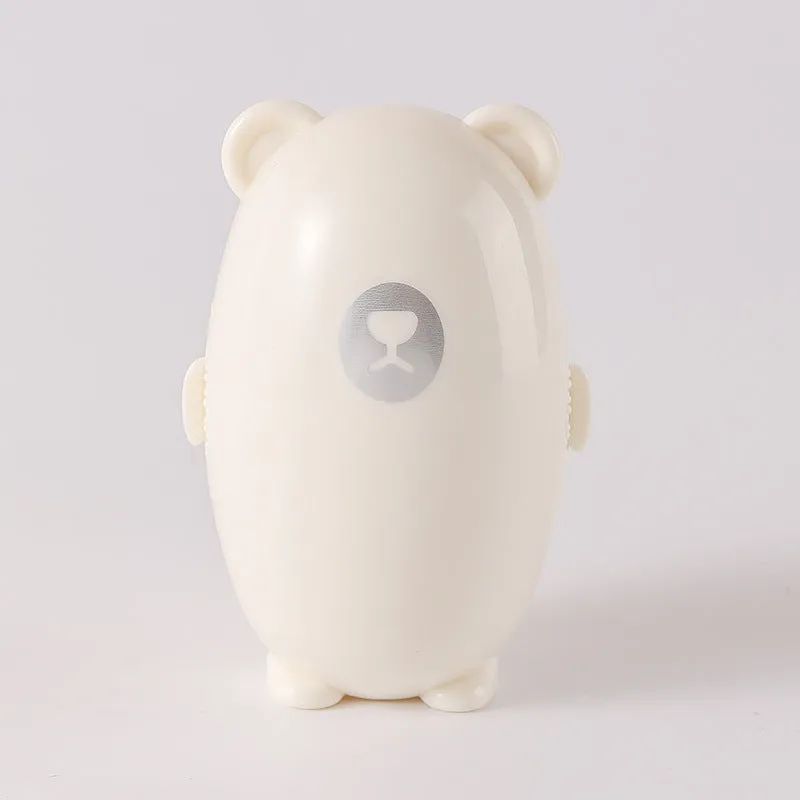 White washable lint roller with removable sticky head for removing hair and dust from fabrics.
