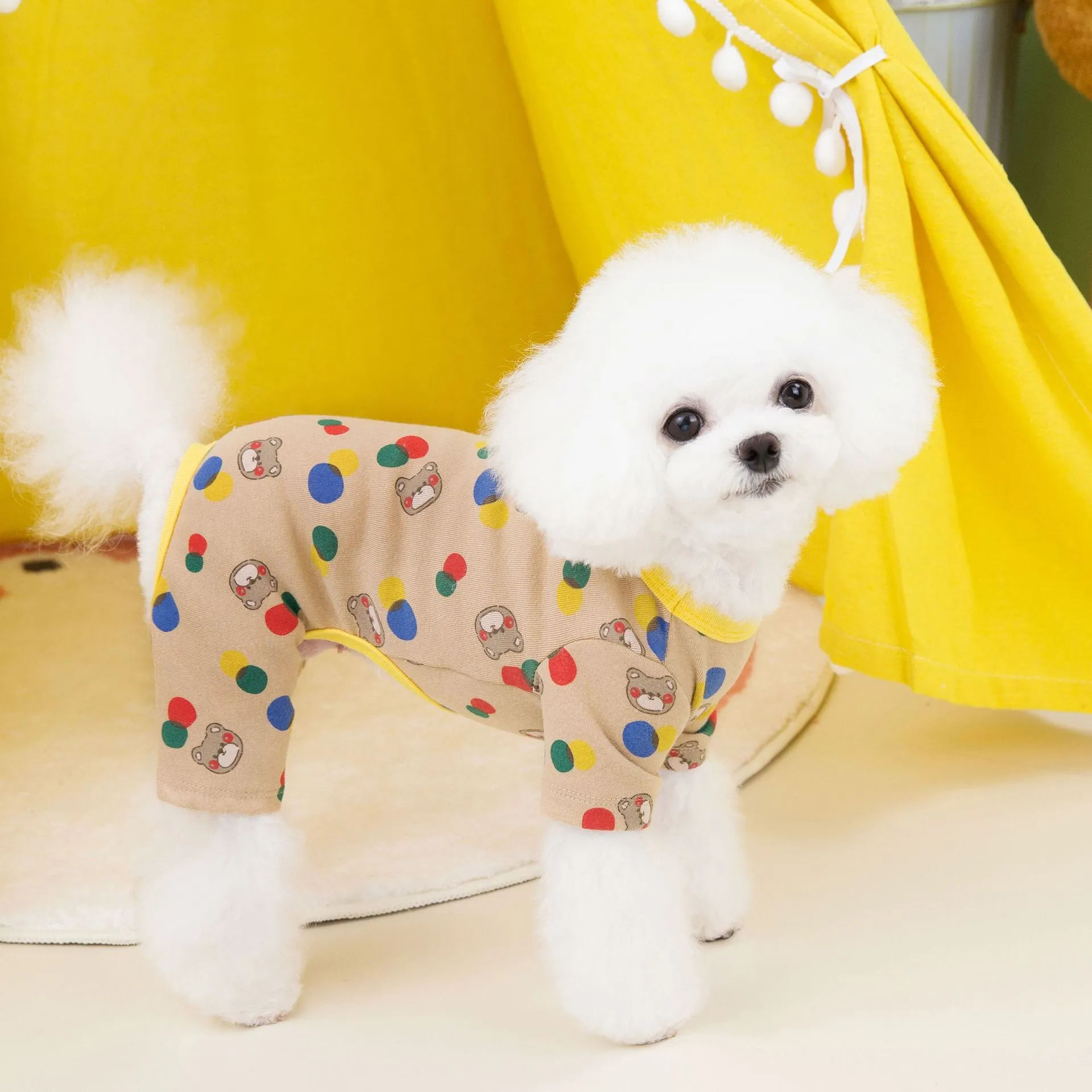 Beige dog jumper with colourful ball bear pattern, showing casual cotton spandex construction.