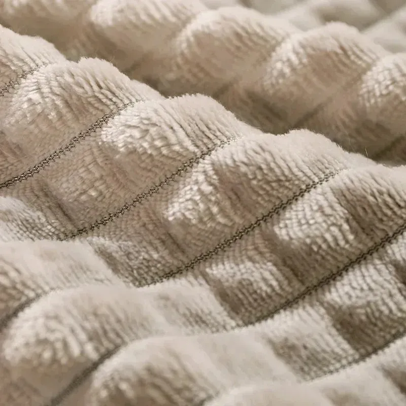 Coffee coloured dog bed with a removable soft fleece blanket, shown in a medium size.