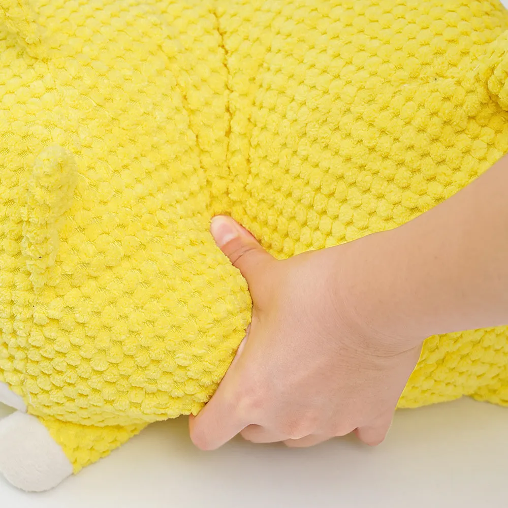 Plush calming dog toy shaped like a pillow, shown in a Large and Medium size.