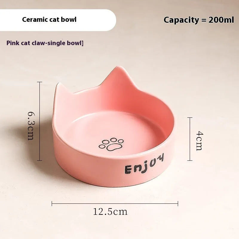 Porcelain cat food bowl with wooden anti-tumble frame in cat paw design