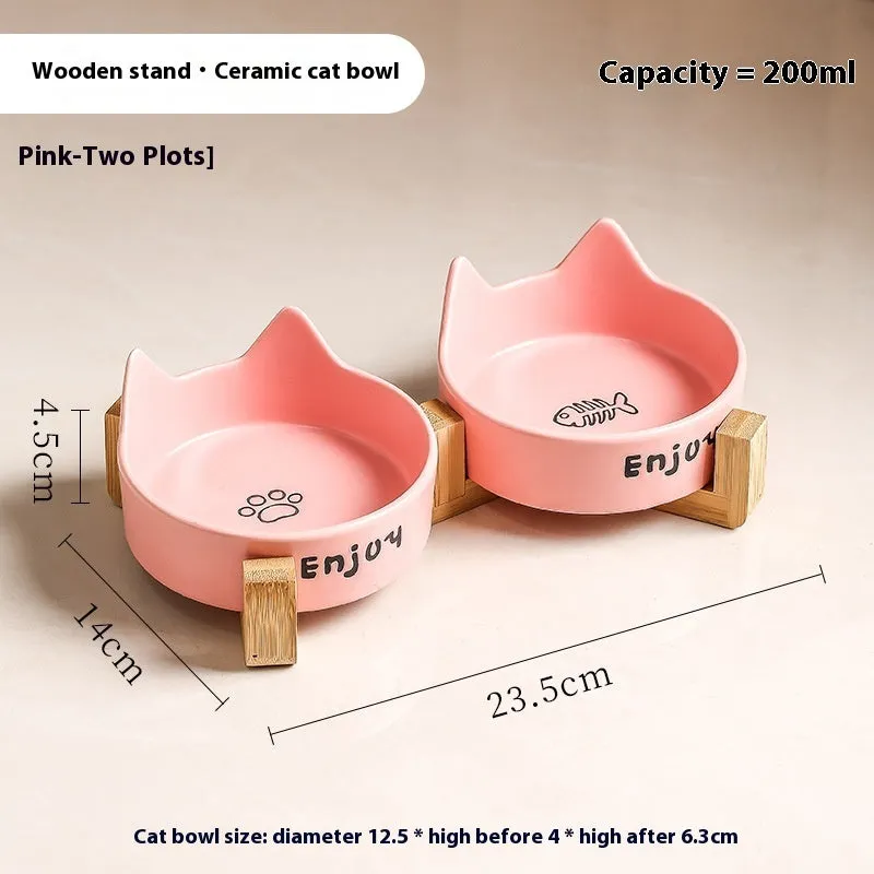 Porcelain cat food bowl with wooden anti-tumble frame in cat paw design
