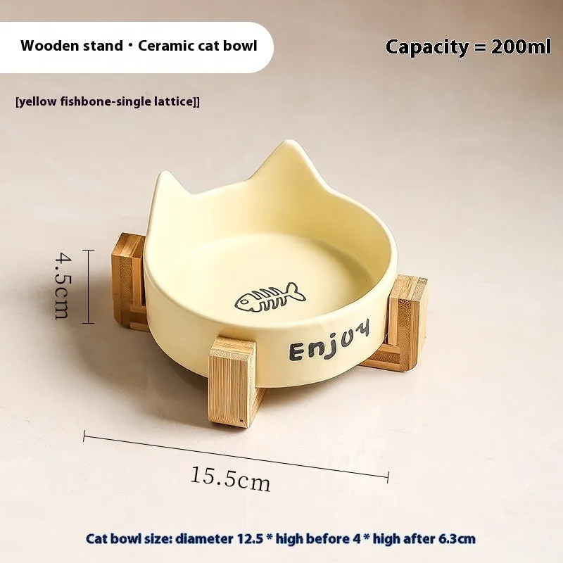 Porcelain cat food bowl with wooden anti-tumble frame in cat paw design