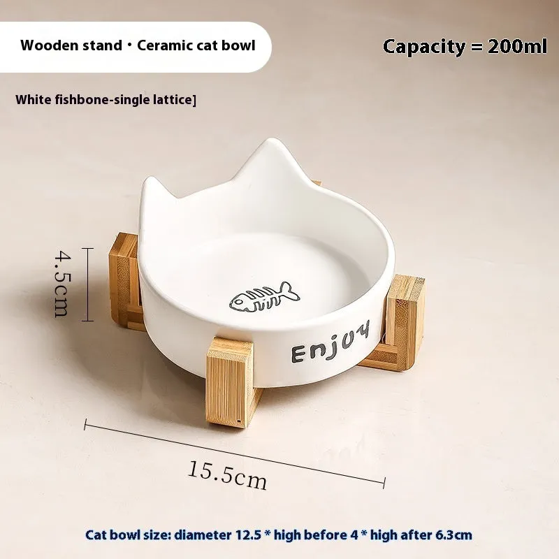 Porcelain cat food bowl with wooden anti-tumble frame in cat paw design
