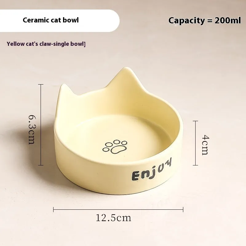 Porcelain cat food bowl with wooden anti-tumble frame in cat paw design