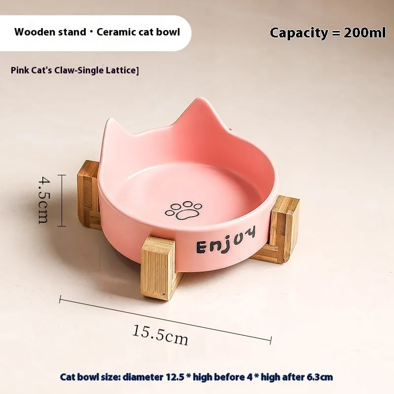 Porcelain cat food bowl with wooden anti-tumble frame in cat paw design