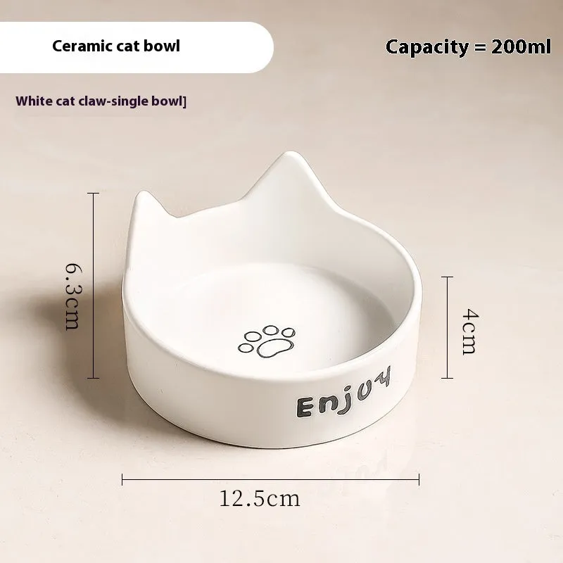 Porcelain cat food bowl with wooden anti-tumble frame in cat paw design