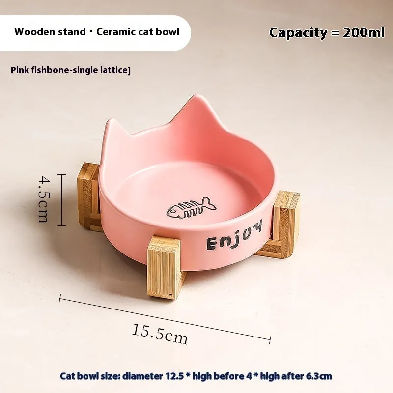 Porcelain cat food bowl with wooden anti-tumble frame in cat paw design
