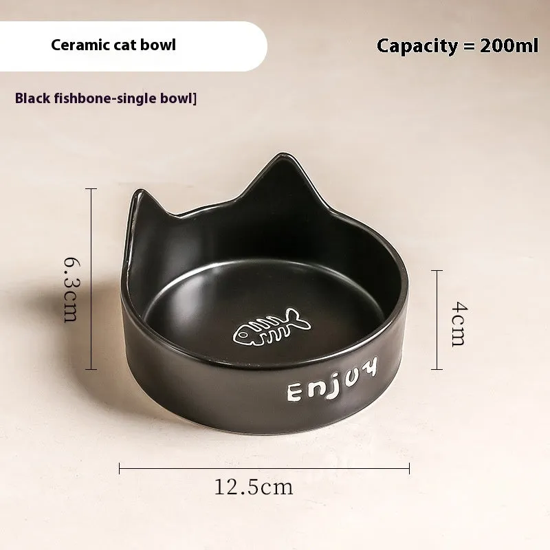 Porcelain cat food bowl with wooden anti-tumble frame in cat paw design