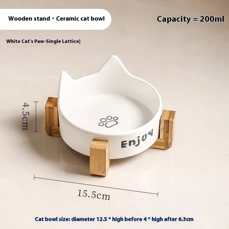 Porcelain cat food bowl with wooden anti-tumble frame in cat paw design