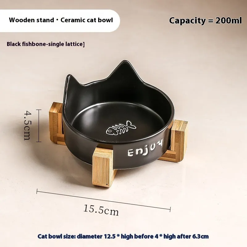 Porcelain cat food bowl with wooden anti-tumble frame in cat paw design
