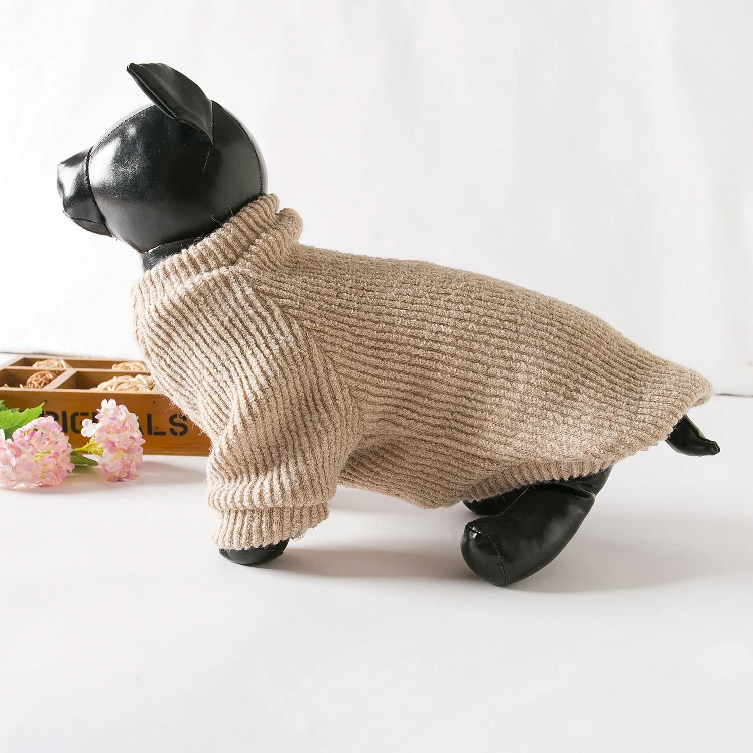 Brown cloth pullover sweater on a small dog, showing casual design and comfortable fit.