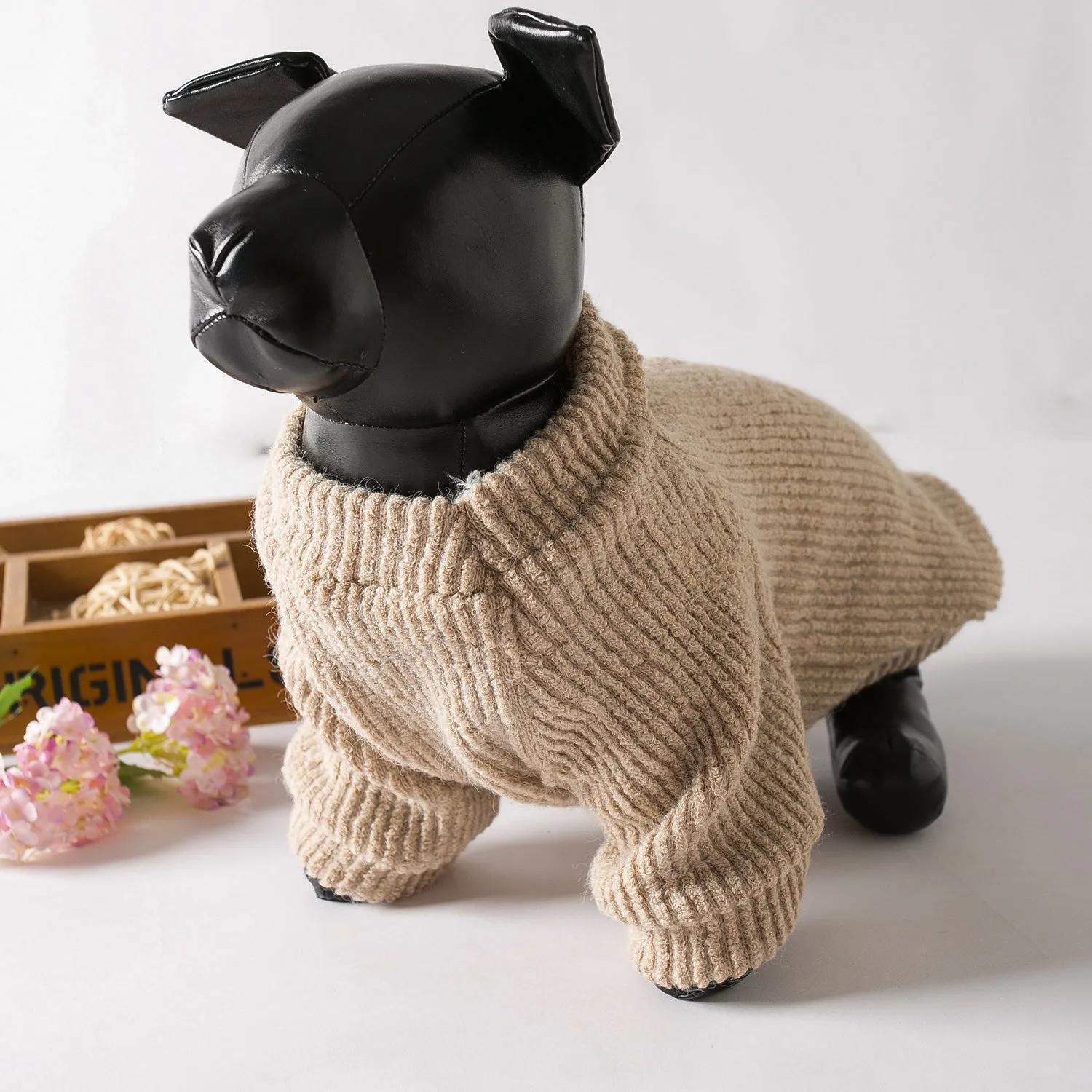 Brown cloth pullover sweater on a small dog, showing casual design and comfortable fit.