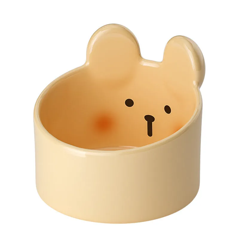 Blush Critter ceramic pet food bowl in white rabbit design, showing raised neck protection ring.