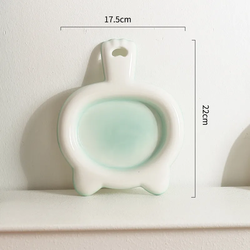 Ceramic cat bowl in blue, green, pink, or yellow colour with a shallow mouth design for pet food and water.