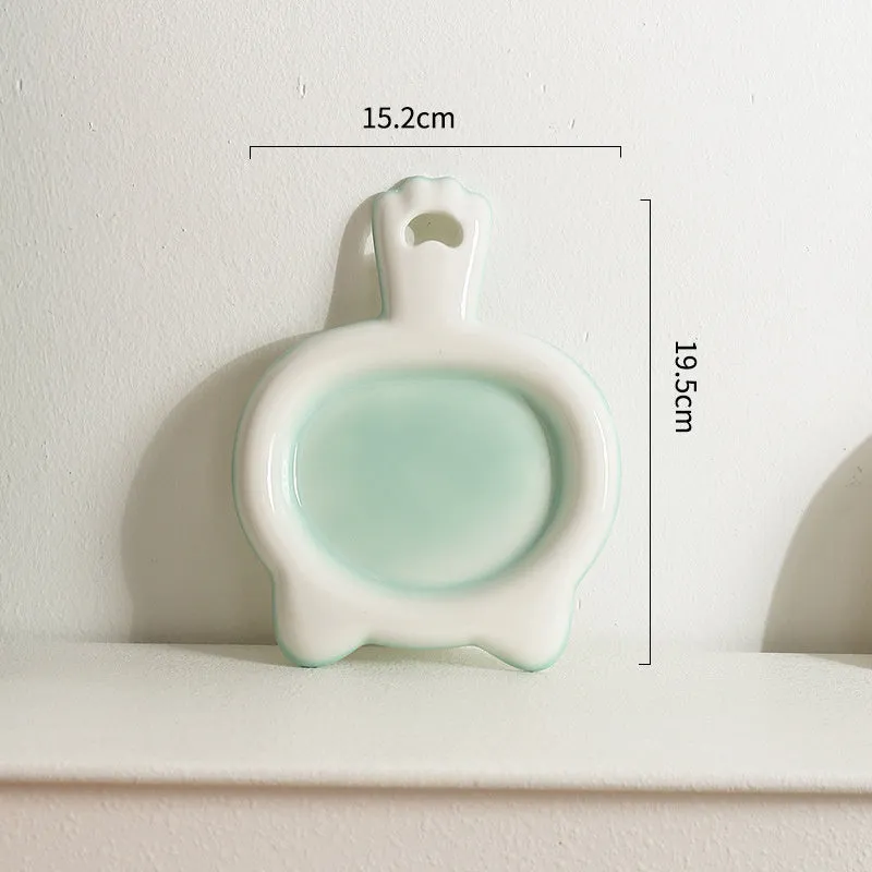 Ceramic cat bowl in blue, green, pink, or yellow colour with a shallow mouth design for pet food and water.