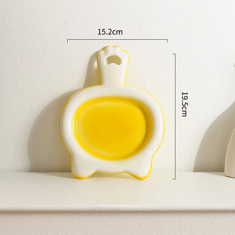 Ceramic cat bowl in blue, green, pink, or yellow colour with a shallow mouth design for pet food and water.