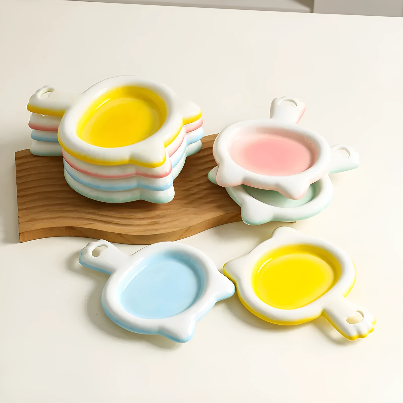 Ceramic cat bowl in blue, green, pink, or yellow colour with a shallow mouth design for pet food and water.