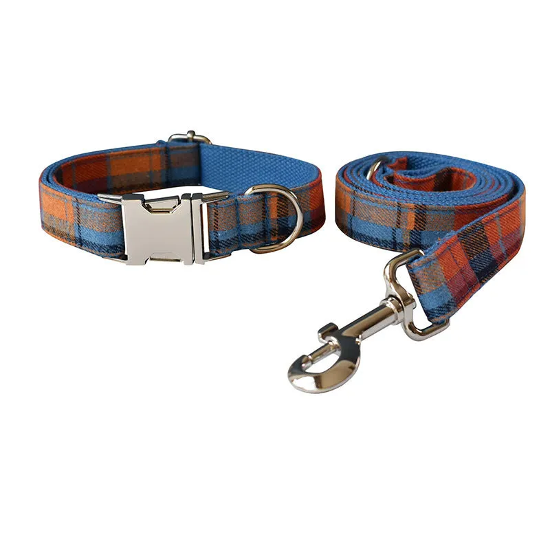 Blue plaid velvet dog collar with metal buckle and bow accessory