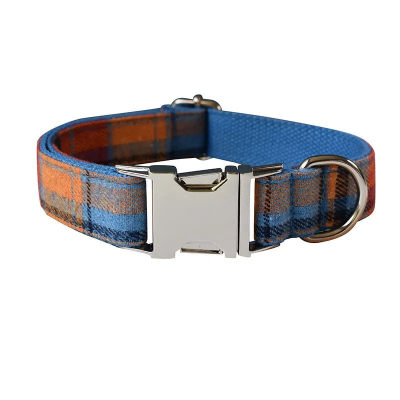 Blue plaid velvet dog collar with metal buckle and bow accessory