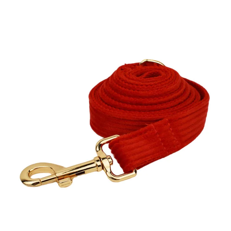Red corduroy dog collar and leash set with matching vest, poop bag, and decorative bow for small to XL dogs
