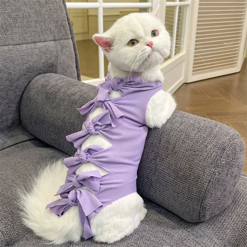 Lace-up polyester cat sterilisation clothing shown in blue on a mannequin, sizes for cats 1.5kg to 9kg.