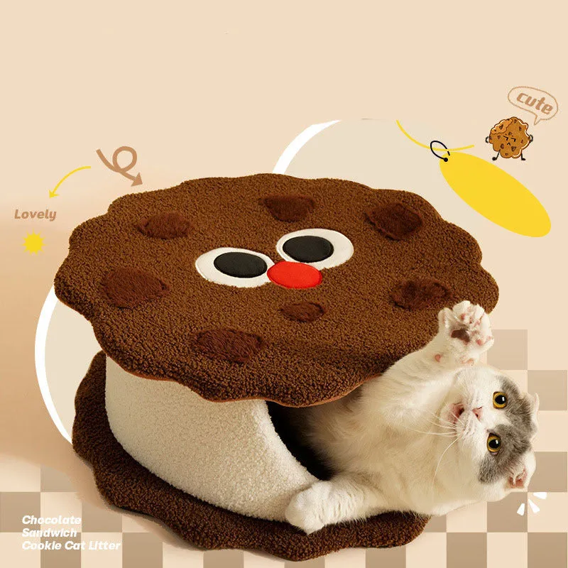 Khaki-coloured closed cat house with a nest shape resembling a sandwich cookie.