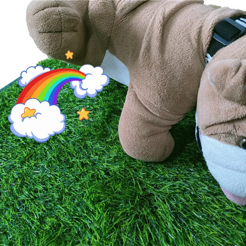 Green washable dog grass pee pad with realistic lawn texture on a patio.