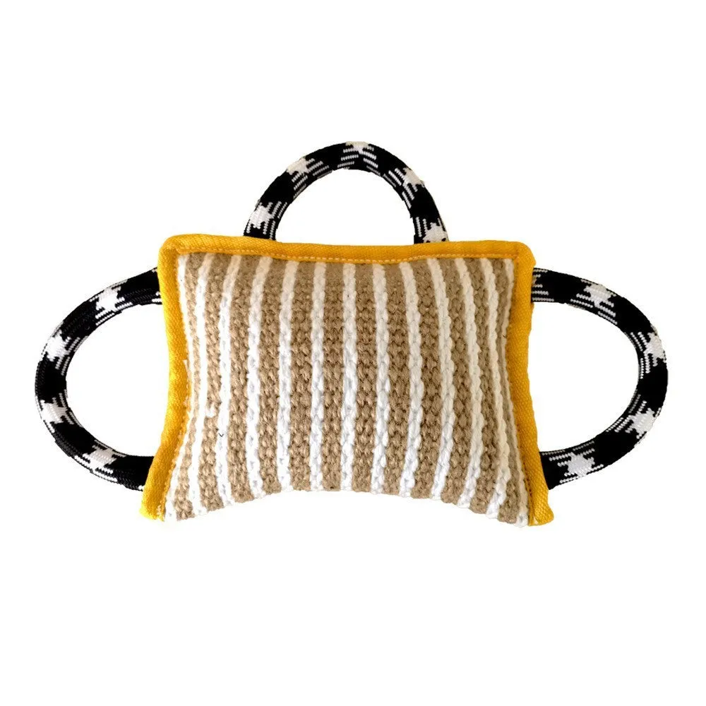 Colourful dog tug toy with a jute bite pillow centre and three rope handles.