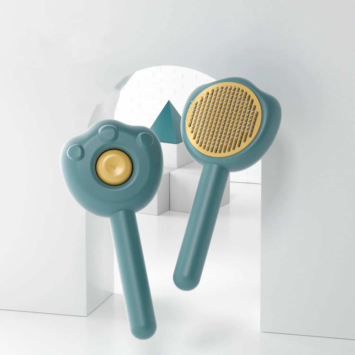 Self-cleaning pet grooming comb in blue, green or yellow for cat brushing and hair removal