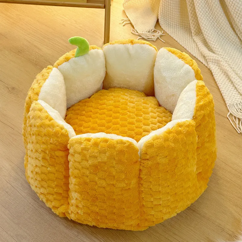 Orange pumpkin-shaped pet nest mat for cats with soft cotton filling in two sizes