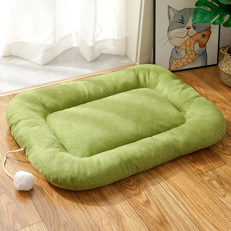 Brown cooling mat for small to medium-sized dogs in kennel setting with size dimensions shown